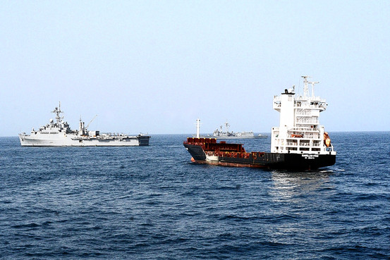 A U.S. Navy photo shows the USS Dubuque, left, and a Turkish frigate, in background, during an operation to retake the Magellan Star from pirates in the Gulf of Aden on Thursday.