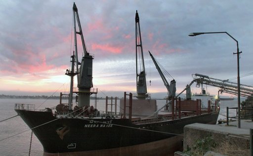 A cargo ship is loaded with wheat in Rosario, Santa Fe province, Argentina. The country's President Cristina Kirchner has accused multinational grain producer Bunge of committing the 