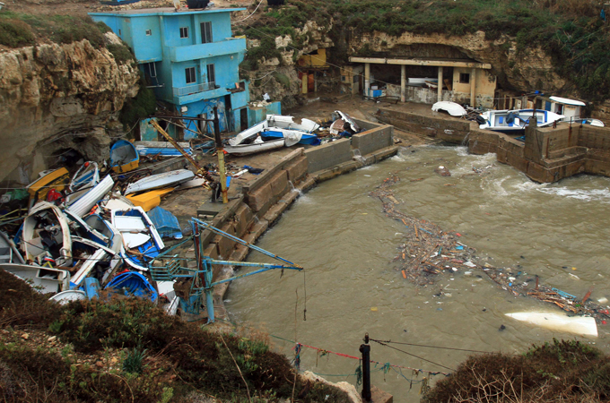 Fishing boats were damaged in Lebanon as the storm smashed into the country's coastline, killing one person
