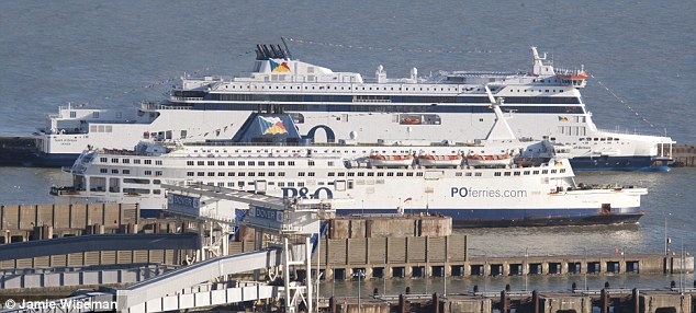 Massive: The new £157million boat, Spirit of Britain, berths into Dover for the first time and dwarfs the old ship, Pride of Calais