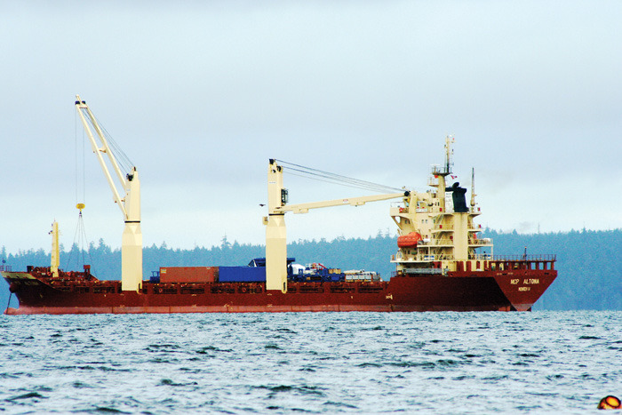 A ship carrying uranium was anchored off the coast of Ladysmith/Chemainus after cargo spilled due to rough seas. 