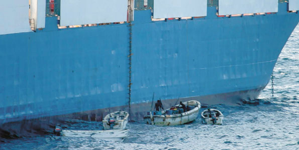 Somali pirates in small boats hijack the mv Faina, a Belize-flagged cargo ship owned and operated by Kaalbye Shipping Ukraine, on September 25, 2008. A South Korean fishing vessel, Fv Golden Wave, was seized on October 9, last year. Photo/FILE 