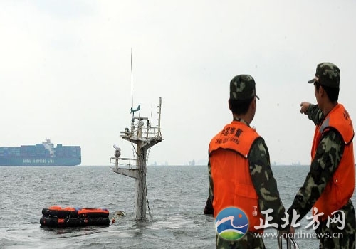Photo taken on Oct 29, 2011 shows the masts of the sunken ship Oriental Sunrise off Qingdao, east China's Shandong province.[Photo/CFP]