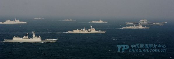 Group sailing: A picture released on Wednesday shows the Liaoning carrier battle group as the nation's first aircraft carrier returns to its home port of Qingdao in Shandong province. (Chinamil.com.cn/Li Jin)