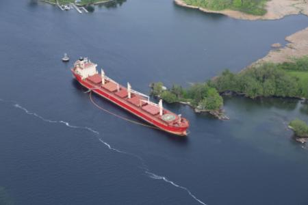 The freighter Federal Kivalina, a 656-foot Hong Kong-flagged vessel, sits at anchor and aground in the St. Lawrence Seaway, May 28, 2014. The Federal Kivalina lost power and ran aground near the Thousand Island Bridge May 27, which has suspended vessel traffic in the St. Lawrence Seaway for several days. U.S. Coast Guard photo courtesy of Robert Fratangelo, Coast Guard Auxiliary