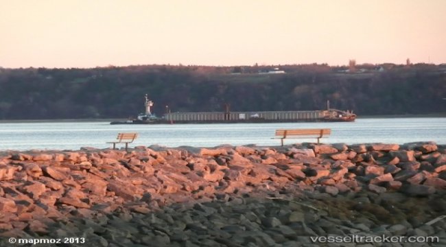 The 'Wilf Seymour' and the barge 'Alouette Spirit', stranded in Lake St