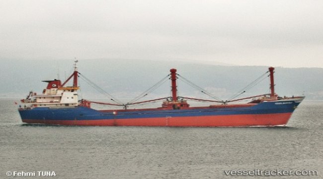 Ship under way to breakers in Aliaga after damage